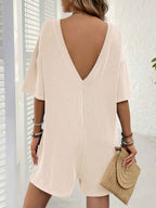 Backless Textured Romper with Round Neck and Half Sleeves for a Trendy Style-Casual Fashion - The Artisan's Wardrobe